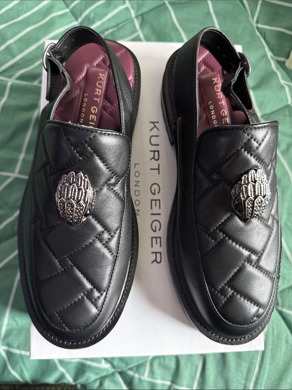 Kurt Geiger Black Quilted Leather Slingback Loafers with Silver Emblem